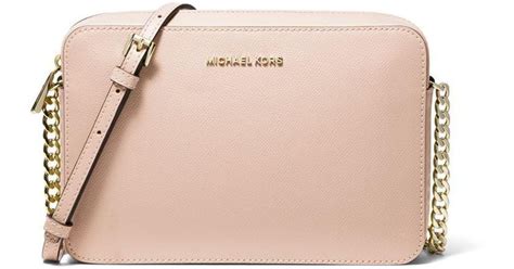 michael kors white and light pink hand bags|Michael Kors pink crossbody bag.